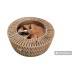 Fan in a wicker basket