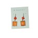 M. Haskell orange pierce earrings.